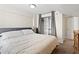 Comfortable bedroom with closet featuring neutral tones, offering a serene retreat with closet and dresser at 2855 Peachtree Ne Rd # 115, Atlanta, GA 30305