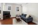 Cozy living room featuring a sectional sofa, coffee table, and natural light at 2855 Peachtree Ne Rd # 115, Atlanta, GA 30305