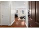 Inviting living area featuring hardwood floors and modern furniture, with natural light enhancing the open space at 2855 Peachtree Ne Rd # 115, Atlanta, GA 30305