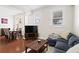 Inviting living space featuring a dining table, seating, and large windows at 2855 Peachtree Ne Rd # 115, Atlanta, GA 30305