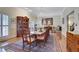 Formal dining room with hardwood floors, chandelier, and large windows at 3835 Paces Ferry Nw Rd, Atlanta, GA 30327