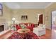 Cozy living room with fireplace, hardwood floors and elegant decor at 3835 Paces Ferry Nw Rd, Atlanta, GA 30327