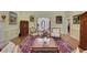 Bright and airy living room with hardwood floors and views to other rooms at 3835 Paces Ferry Nw Rd, Atlanta, GA 30327