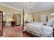 Bright main bedroom with luxurious bedding and an ensuite bathroom at 3835 Paces Ferry Nw Rd, Atlanta, GA 30327