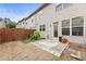 Backyard features concrete patio, planting, and private fencing at 5016 Whiteoak Se Pointe, Smyrna, GA 30080