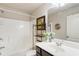 Bathroom with tub and shower features vanity with modern sink and fixtures at 5016 Whiteoak Se Pointe, Smyrna, GA 30080