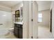 Bathroom with tub and shower features vanity with modern sink and fixtures at 5016 Whiteoak Se Pointe, Smyrna, GA 30080