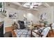 Bright living room featuring a fireplace, modern furniture, and coffered ceilings, ideal for comfortable living and entertaining at 5016 Whiteoak Se Pointe, Smyrna, GA 30080