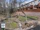 Scenic community walking path with a creek and wooden bridge for resident's enjoyment at 5016 Whiteoak Se Pointe, Smyrna, GA 30080