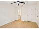 Bedroom features wood floors, ceiling fan, bathroom access and closet at 5638 River Heights Se Xing, Marietta, GA 30067