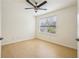 This bedroom has a ceiling fan and natural light from the window at 5638 River Heights Se Xing, Marietta, GA 30067