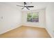 This bedroom has a ceiling fan and natural light from the window at 5638 River Heights Se Xing, Marietta, GA 30067