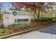Elegant Kinstone Columns Drive sign amidst landscaping and trees, welcoming residents at 5638 River Heights Se Xing, Marietta, GA 30067