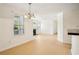 Bright, open floor plan with a view of the fireplace and kitchen at 5638 River Heights Se Xing, Marietta, GA 30067