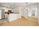 Open living area with a stainless steel refrigerator and view of the hallway at 5638 River Heights Se Xing, Marietta, GA 30067