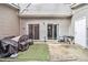Spacious backyard featuring siding, patio, covered items, and a grill at 780 Nehemiah Sw Ln # 37, Atlanta, GA 30331