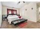 Cozy bedroom featuring carpeted floors, a bed with storage, and decor at 780 Nehemiah Sw Ln # 37, Atlanta, GA 30331