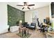Comfortable bedroom with leafy accent wall and ceiling fan for added comfort at 780 Nehemiah Sw Ln # 37, Atlanta, GA 30331