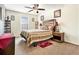 The bedroom offers a ceiling fan, a queen-size bed, and carpeted floors at 780 Nehemiah Sw Ln # 37, Atlanta, GA 30331