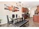 The kitchen flows into the dining area with stainless steel appliances and modern decor at 780 Nehemiah Sw Ln # 37, Atlanta, GA 30331