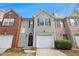 Charming townhome with a well-maintained front yard and attached one car garage at 780 Nehemiah Sw Ln # 37, Atlanta, GA 30331