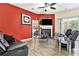 Inviting living room features a cozy fireplace, dark-toned leather seating, and a ceiling fan at 780 Nehemiah Sw Ln # 37, Atlanta, GA 30331