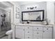 The updated bathroom has a tile shower, updated vanity, and modern fixtures at 90 Chimney Rise Ct, Stockbridge, GA 30281