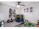 This bedroom features a ceiling fan, window and lots of space to play at 90 Chimney Rise Ct, Stockbridge, GA 30281