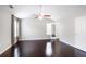 Primary bedroom with ceiling fan, wood floors and natural lighting at 350 Marble Springs Rd, Lilburn, GA 30047