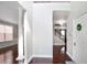 Bright foyer featuring hardwood floors, a staircase to the upper level, and a white front door at 350 Marble Springs Rd, Lilburn, GA 30047