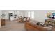 Open-concept living room flows seamlessly into the kitchen and dining area, great for entertaining at 500 West Avenue, Bowdon, GA 30108