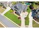 Expansive aerial view of a home featuring a pool, well-manicured lawn, and an extended driveway at 968 Woodtrace Ln, Auburn, GA 30011