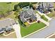 Stunning aerial view of a large estate featuring a pool, manicured lawns, and a grand home at 968 Woodtrace Ln, Auburn, GA 30011