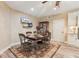 Inviting dining room with a wood table, seating for eight, and a decorative rug at 968 Woodtrace Ln, Auburn, GA 30011