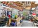 Organized garage space featuring a workbench, storage shelves, and various tools at 968 Woodtrace Ln, Auburn, GA 30011