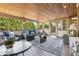 Light-filled sunroom featuring a cozy seating area with outdoor views at 968 Woodtrace Ln, Auburn, GA 30011