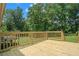 Close up view of backyard deck showing deck's railing, construction, and expansive views at 10 Powder Dr, Dallas, GA 30157