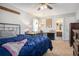 Bedroom with carpet, ceiling fan, and work desk at 10 Powder Dr, Dallas, GA 30157