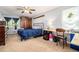 Bedroom with carpet, ceiling fan, work desk and large built in wardrobe at 10 Powder Dr, Dallas, GA 30157