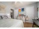 Bright bedroom featuring a window, closet, and a cabinet at 10 Powder Dr, Dallas, GA 30157
