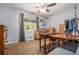 Bedroom with a window, light grey walls, ceiling fan, light-colored carpet, and wardrobe at 10 Powder Dr, Dallas, GA 30157