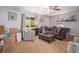 Spacious living room with neutral walls, plush seating, and a large window at 10 Powder Dr, Dallas, GA 30157