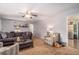 Inviting living room features neutral tones, comfortable seating, and ample natural light at 10 Powder Dr, Dallas, GA 30157