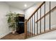 Finished basement corner with an arcade game and stairway at 209 Phillips Ln, Alpharetta, GA 30009