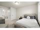 Bedroom featuring an ensuite bathroom, and white painted walls at 209 Phillips Ln, Alpharetta, GA 30009