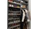 Custom closet with ample storage for shoes, purses, and hanging clothes at 209 Phillips Ln, Alpharetta, GA 30009
