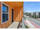 Balcony with wood railing, providing outdoor space and neighborhood views at 2036 Bixby Byway Se Dr, Atlanta, GA 30317