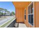Balcony with wood railing, offering outdoor space and views of the surrounding neighborhood at 2036 Bixby Byway Se Dr, Atlanta, GA 30317