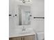 Modern bathroom boasts stylish mirror, sink, and fixtures at 2036 Bixby Byway Se Dr, Atlanta, GA 30317