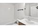 A bright bathroom with tub and shower combo and single sink at 2036 Bixby Byway Se Dr, Atlanta, GA 30317